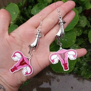 Sword swallowing uterus earrings